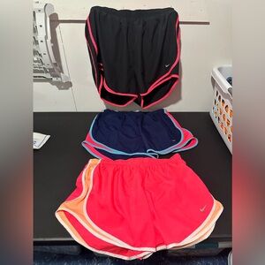 Women’s 3 pair of Nike running shorts.